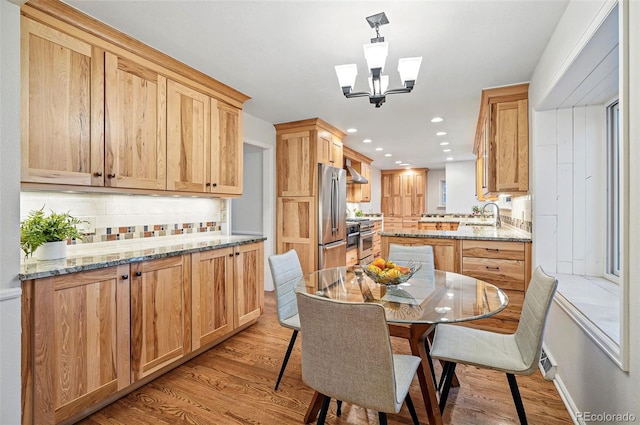 10849 E Crestridge Cir, Englewood, CO 80111 - dining space with light wood-style floors, recessed lighting, and a chandelier