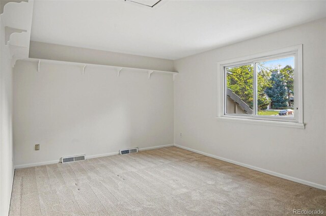 10849 E Crestridge Cir, Englewood, CO 80111 - spare room featuring carpet flooring and baseboards