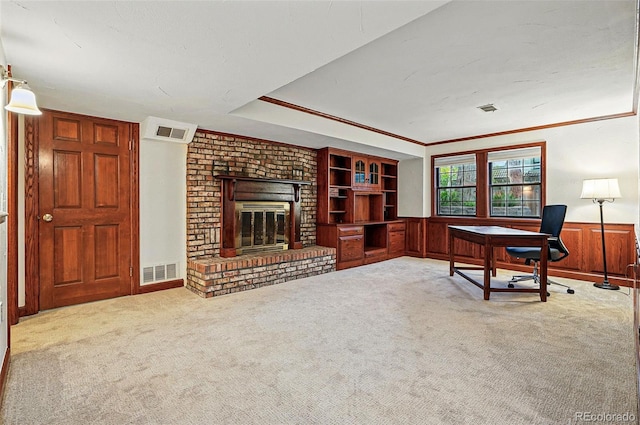 10849 E Crestridge Cir, Englewood, CO 80111 - carpeted office featuring a wainscoted wall, a brick fireplace, crown molding, and wood walls