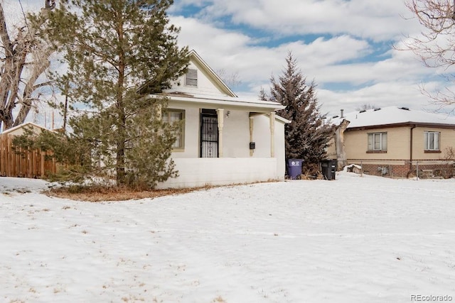 view of front of property with fence