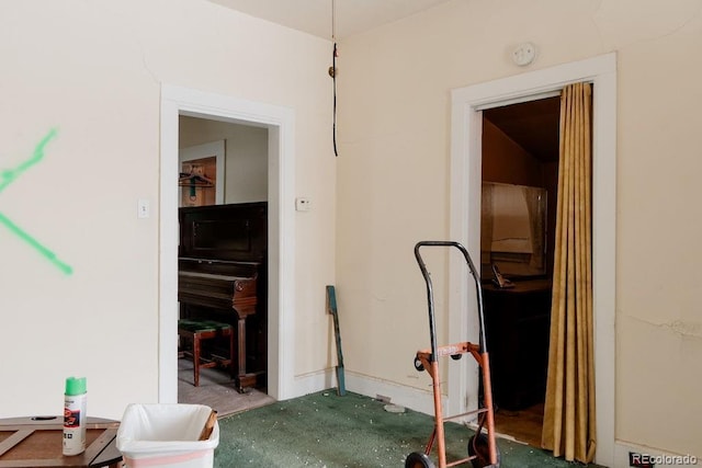 hallway featuring unfinished concrete floors