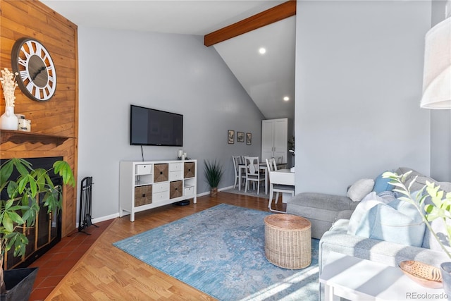 living room featuring dark hardwood / wood-style flooring, lofted ceiling with beams, and wood walls