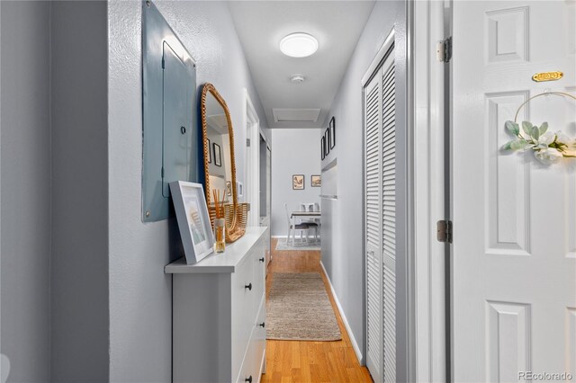 hallway with light wood-type flooring