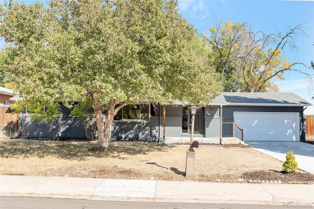 obstructed view of property featuring a garage