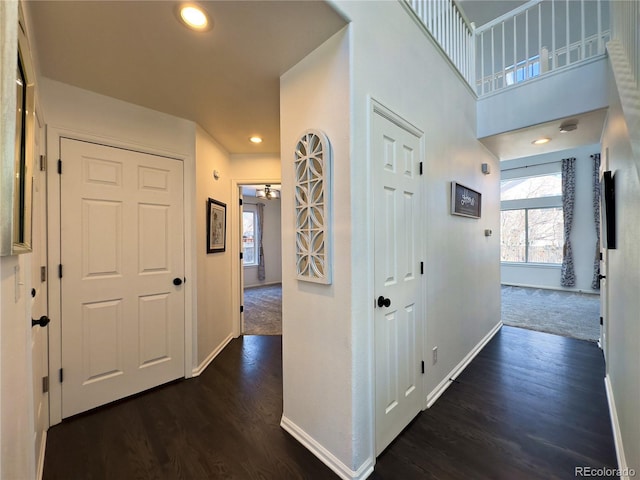 hallway featuring dark wood-type flooring