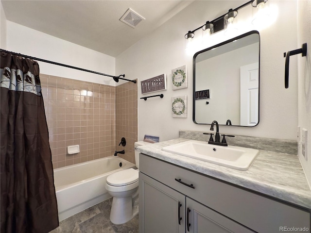 full bathroom featuring toilet, vanity, and shower / tub combo