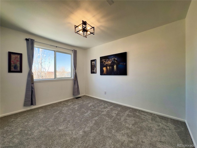 view of carpeted spare room