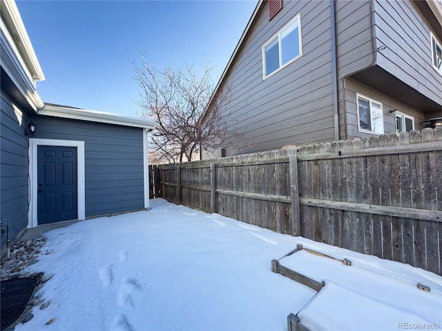 view of yard covered in snow