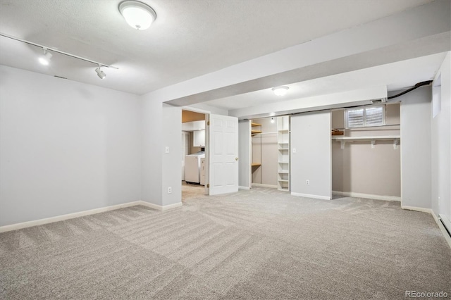 7863 W Quarto Ave, Littleton, CO 80128 - unfurnished bedroom with light colored carpet, rail lighting, and baseboards