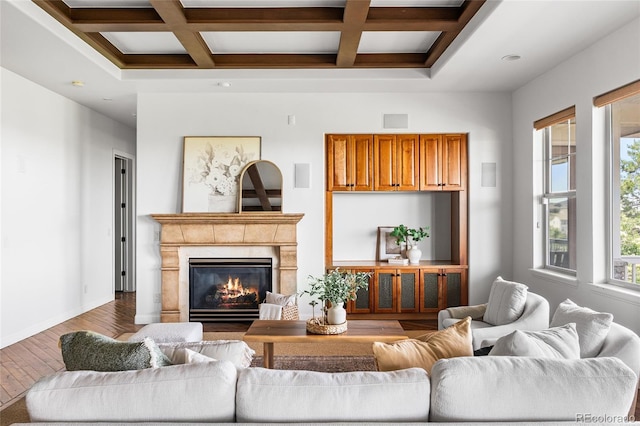 27485 E Nova Pl, Aurora, CO 80016 - living room featuring hardwood / wood-style floors, coffered ceiling, beamed ceiling, and a premium fireplace