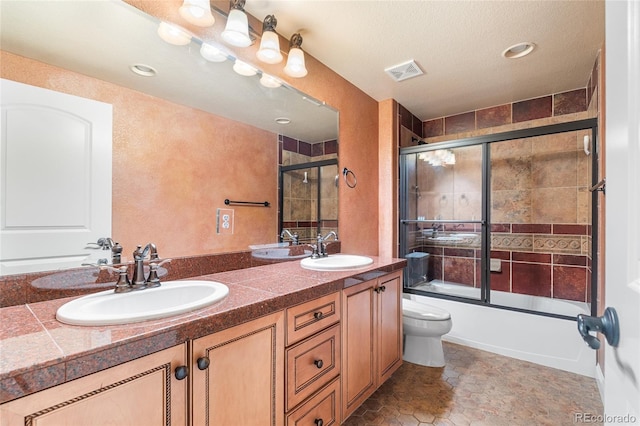 27485 E Nova Pl, Aurora, CO 80016 - bathroom featuring shower / bath combination with glass door and double vanity