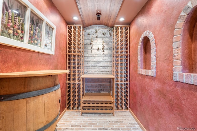 27485 E Nova Pl, Aurora, CO 80016 - wine room featuring brick floors and recessed lighting
