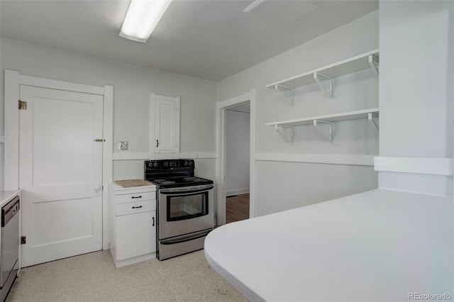 150 S Garfield St, Denver, CO 80209 - kitchen with stainless steel appliances, white cabinets, light countertops, open shelves, and light floors