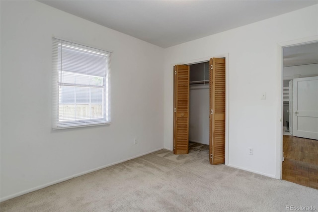 150 S Garfield St, Denver, CO 80209 - unfurnished bedroom with carpet floors, baseboards, and a closet