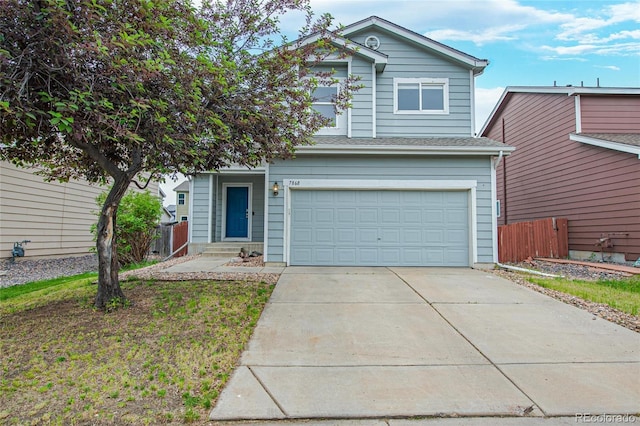 7868 Downing St, Denver, CO 80229 - traditional-style home featuring a garage and driveway