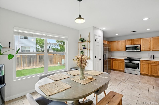 7868 Downing St, Denver, CO 80229 - dining room with recessed lighting and baseboards