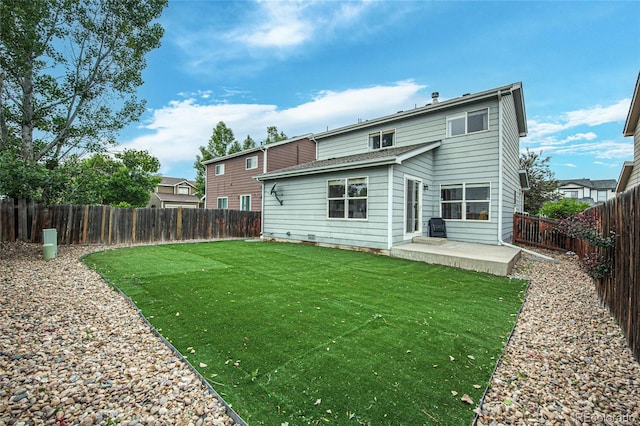 7868 Downing St, Denver, CO 80229 - back of property featuring a patio area