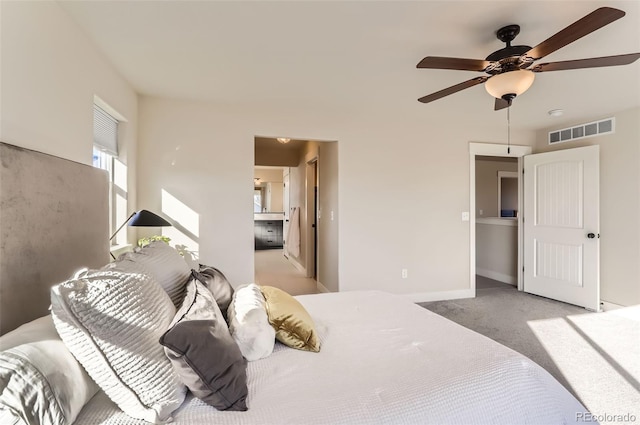 bedroom with light carpet and ceiling fan