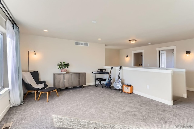 sitting room with light carpet