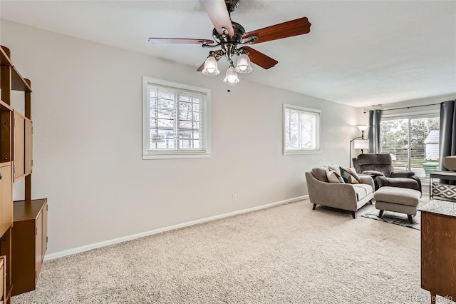 1011 Uvalda St, Aurora, CO 80011 - living area featuring carpet and ceiling fan
