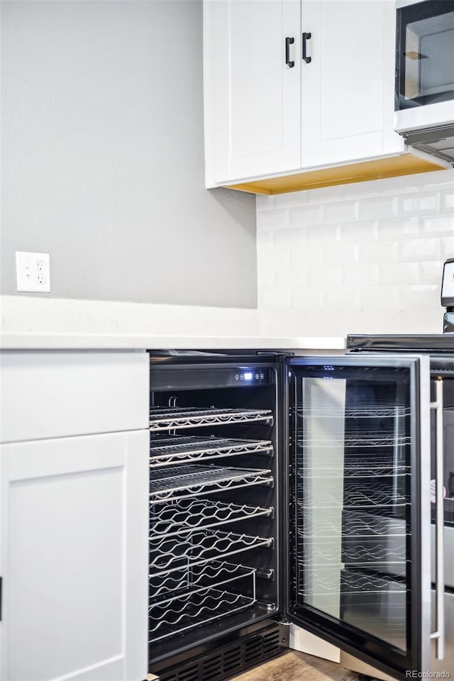 room details with backsplash and beverage cooler