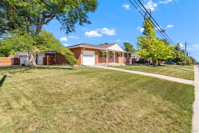 2101 Youngfield St, Golden, CO 80401 - single story home featuring a garage, brick siding, and covered porch