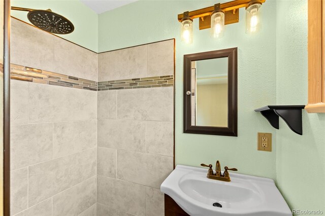 2101 Youngfield St, Golden, CO 80401 - bathroom featuring a sink and tiled shower