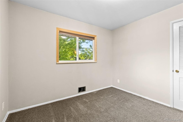 2101 Youngfield St, Golden, CO 80401 - empty room featuring carpet flooring and baseboards