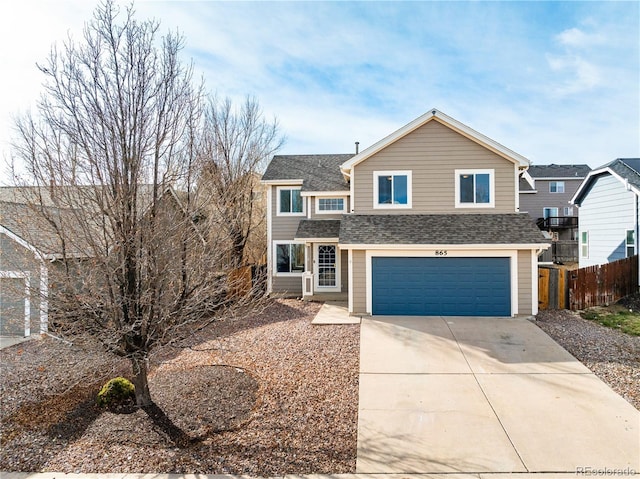 front of property with a garage