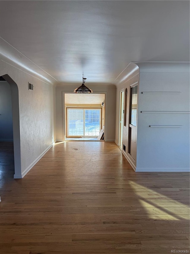 interior space with dark hardwood / wood-style flooring