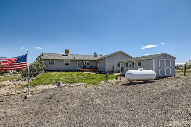 7716 Shenandoah Dr, Elizabeth, CO 80107 - back of house with a lawn