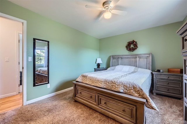 7716 Shenandoah Dr, Elizabeth, CO 80107 - bedroom featuring light colored carpet, baseboards, and ceiling fan