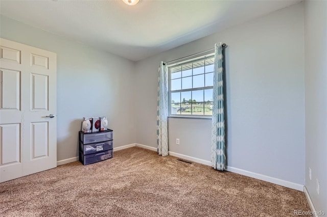 7716 Shenandoah Dr, Elizabeth, CO 80107 - carpeted empty room with baseboards