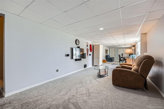 7716 Shenandoah Dr, Elizabeth, CO 80107 - carpeted living room with a paneled ceiling and baseboards