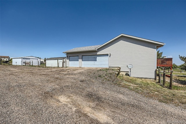 7716 Shenandoah Dr, Elizabeth, CO 80107 - view of side of property with a detached garage