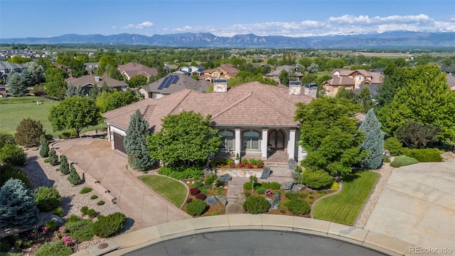 2378 Plumb Pl, Erie, CO 80516 - aerial view of residential area featuring a mountainous background