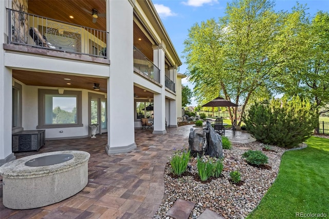 2378 Plumb Pl, Erie, CO 80516 - patio / terrace featuring a fire pit and a patio area