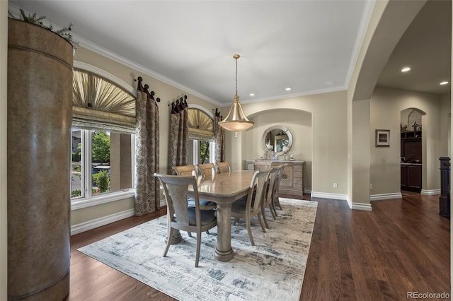 2378 Plumb Pl, Erie, CO 80516 - dining space with arched walkways, dark wood-style flooring, recessed lighting, and crown molding
