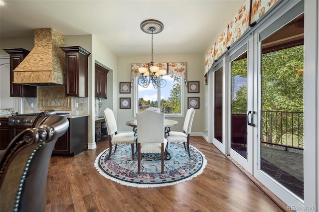 2378 Plumb Pl, Erie, CO 80516 - dining room with dark wood finished floors and a chandelier