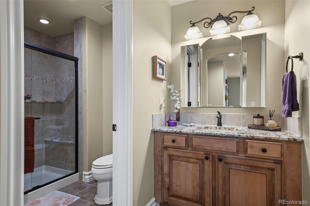 2378 Plumb Pl, Erie, CO 80516 - bathroom with a shower stall, vanity, and tile patterned floors