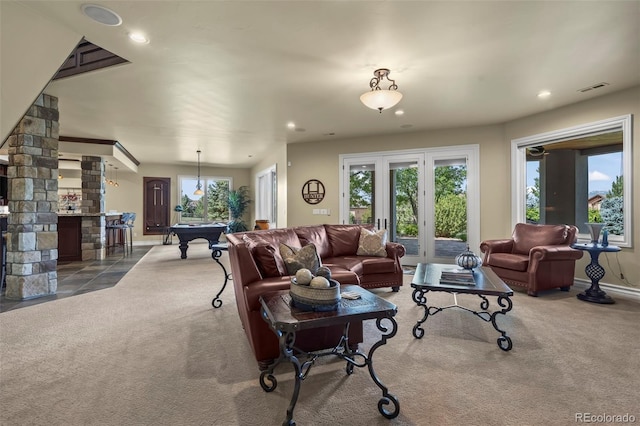 2378 Plumb Pl, Erie, CO 80516 - carpeted living room with billiards, plenty of natural light, recessed lighting, french doors, and bar area