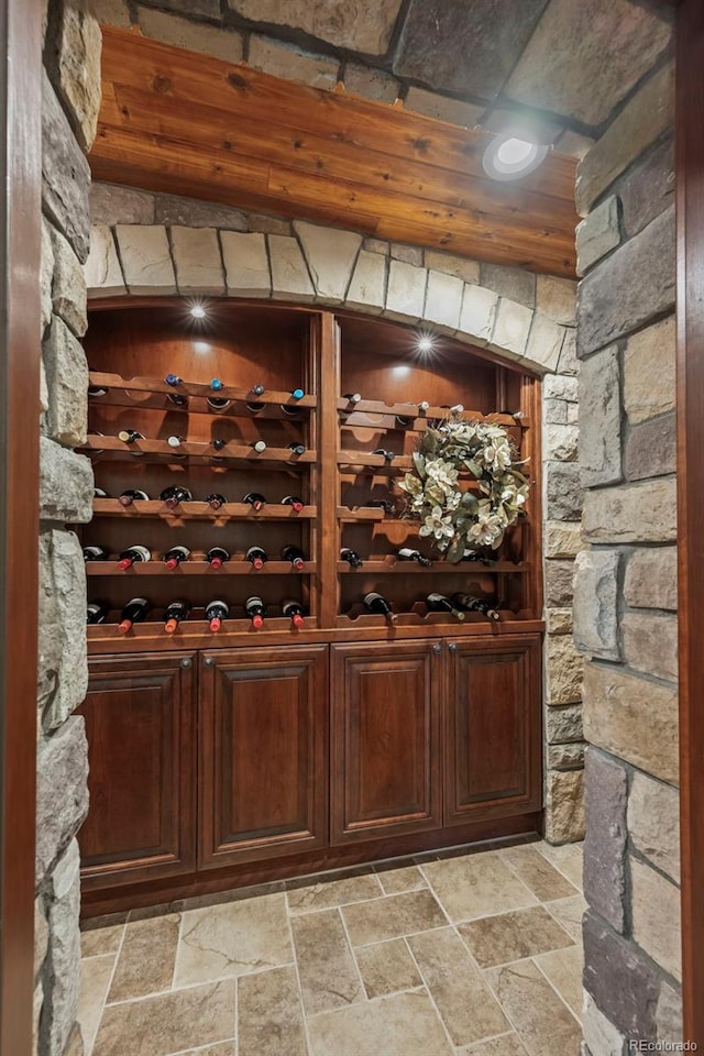 2378 Plumb Pl, Erie, CO 80516 - wine room with stone tile flooring