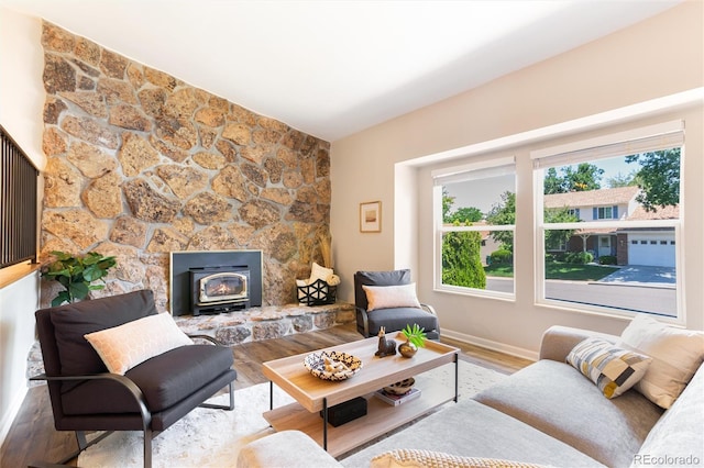 1168 E Kettle Pl, Centennial, CO 80122 - living area featuring wood finished floors and a wood stove