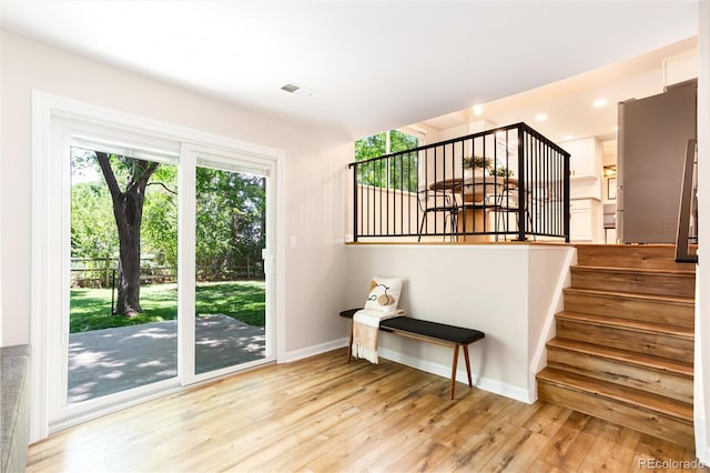 1168 E Kettle Pl, Centennial, CO 80122 - doorway with wood finished floors and stairway