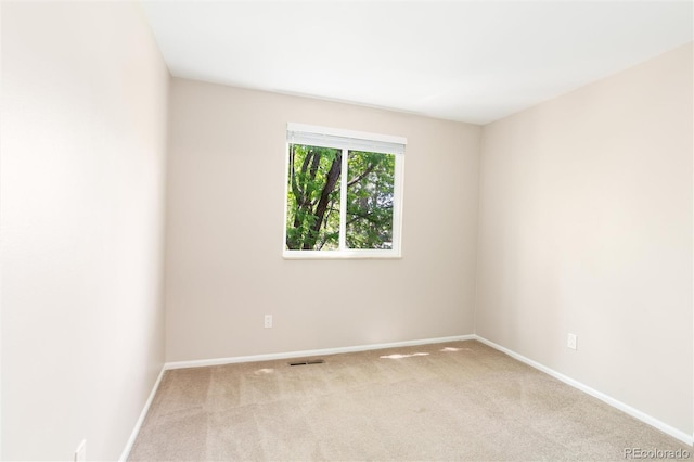 1168 E Kettle Pl, Centennial, CO 80122 - carpeted empty room with baseboards