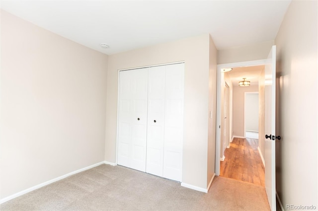 1168 E Kettle Pl, Centennial, CO 80122 - unfurnished bedroom featuring light colored carpet and a closet