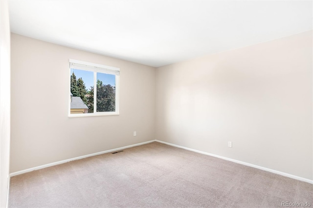 1168 E Kettle Pl, Centennial, CO 80122 - carpeted spare room with baseboards