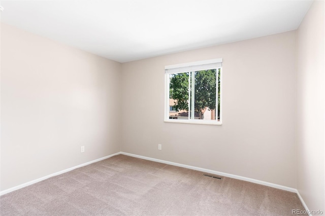 1168 E Kettle Pl, Centennial, CO 80122 - carpeted empty room with baseboards