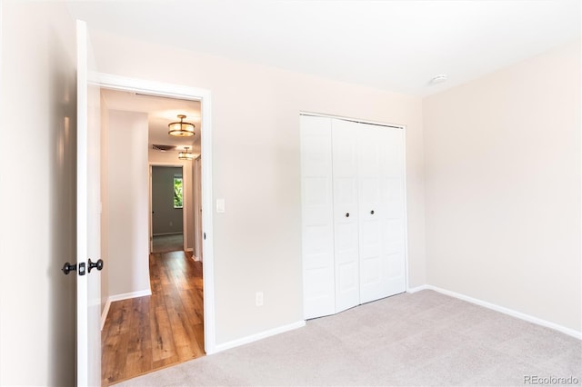 1168 E Kettle Pl, Centennial, CO 80122 - unfurnished bedroom with baseboards and a closet