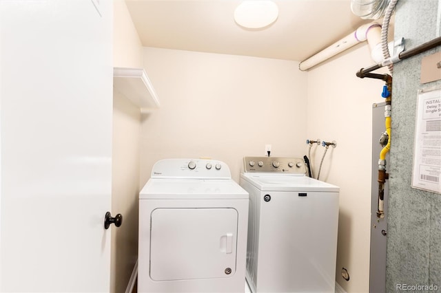 1168 E Kettle Pl, Centennial, CO 80122 - washroom with washer and clothes dryer